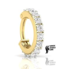 an image of a gold ring with diamonds