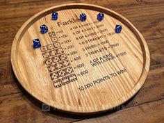 a wooden board with dices and numbers on it