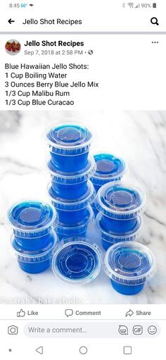 blue jello shots are stacked on top of each other