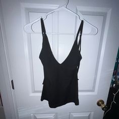 Adjustable Strap, Cute Halter Top With Built In Cami Bra. Brand New With Tags Black Top With Built-in Bra For Day Out, Black Tops With Built-in Bra For Day Out, Versatile Black Halter Top With Built-in Bra, Black Halter Cami Top With Built-in Bra, Black Halter Top With Built-in Bra And Underwire, Black Stretch Halter Top With Built-in Bra, Ribbed Halter Top, Black Stretch V-neck Halter Top, Cami Bra