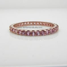 Pink Sapphire Eternity Ring Rose Gold Plated over by 360Diamonds Rose Gold Cubic Zirconia Sapphire Ring With Prong Setting, Rose Gold Ring With Pink Sapphire, Rose Gold Pink Sapphire Round Cut Jewelry, Rose Gold Round Sapphire Cubic Zirconia Ring, Round Rose Gold Cubic Zirconia Sapphire Ring, Rose Gold Pink Sapphire Stackable Rings For Anniversary, Rose Gold Stackable Rings With Pink Sapphire For Anniversary, Rose Gold Stackable Rings With Gemstone, Round Cut, Rose Gold Stackable Rings With Gemstones