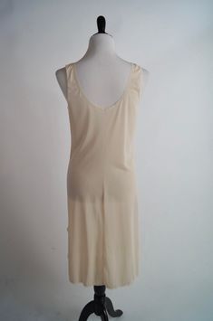 "This is a lovely vintage slip by A&M that was made in Egypt. It is a blush pink half slip with lace trim and insets. It hits at the knee. It is in excellent condition. Size: Small Bust: 35\" Waist: 32\" hips: 42\" Length: 40\"" Beige Lace Trim Slip Dress For Summer, Spring Cream Bias Cut Slip Dress, Spring Cream Slip Dress With Lace Trim, Summer Cream Slip Dress With Lace Trim, Liquid Satin, Peignoir Sets, Vintage Slip, Satin Kimono, Vintage Slips