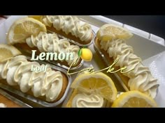 lemon loaf cake with icing and sliced lemons