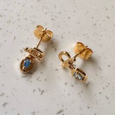 Our Seafare Studs feature a teardrop faceted ocean blue crystal connected by a tiny knotted top. A beautifully minimal, perfect little duo to bring a touch of sparkle to your ears. Measures 12mm x 7mm. Our materials make for an amazing, high quality, seamless, jewelry piece with longevity. Our earrings are plated with 18k gold, 18k rose gold, or rhodium and finished with a protective coating. A little secret we’ll keep between us: it looks way more than it costs. Knotted Top, Diamond Huggie Earrings, Stud Earrings Gold, Circle Earrings Studs, Bow Jewelry, Link Earrings, Between Us, Hoop Earring Sets, Circle Studs