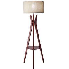 a wooden floor lamp with a white shade