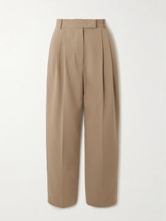 Two words The Frankie Shop uses to describe the label's clothing are unfussy and minimal, which is what makes its pieces so wearable. These 'Bea' pants are tailored from beige crepe with pressed creases through the tapered legs. They look just as great styled with the matching blazer as they do with a tucked-in top or sweater.  Large to size. See Size & Fit notes. The Frankie Shop, Frankie Shop, Pleated Trousers, Pleated Pants, Fall Shopping, Pants Straight, David Yurman, Straight Leg Pants, Tapered Legs