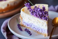 there is a piece of cake with purple flowers on it