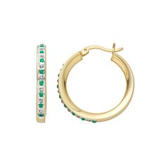 Add a sleek, modern look to your jewelry collection with these hoop earrings. These 18k gold-over-sterling silver earrings feature alternating emerald stones and diamond accents that are sure to dazzle. Brighten your look with these stunning hoop earrings.Add a sleek, modern look to your jewelry collection with these hoop earrings. These 18k gold-over-sterling silver earrings feature alternating emerald stones and diamond accents that are sure to dazzle. Brighten your look with these stunning ho Green Huggie Hoop Earrings For Anniversary, Yellow Gold Hoop Earrings With Birthstone, Green Small Hoop Huggie Earrings For Anniversary, Anniversary Small Hoop Earrings With Birthstone, Elegant Hoop Huggie Earrings With Birthstone, Elegant Birthstone Huggie Hoop Earrings, Gold Small Hoop Earrings For May Birthstone, Hoop Earrings In Yellow Gold For May Birthstone, Yellow Gold Hoop Earrings For May Birthstone