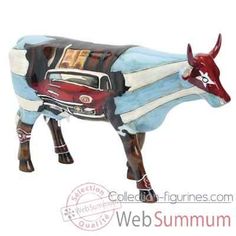 a cow statue with a car painted on it's body