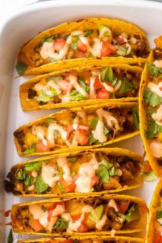 These Cheeseburger Baked Tacos are filled with barbecue ground beef and cheddar cheese and topped with all your favorite burger toppings! It's an easy dinner recipe that's great for prepping ahead. #groundbeef #dinner #recipe | ground beef recipes | taco recipe | make ahead meal | easy dinner ideas | dinner recipes | bbq | barbecue sauce | cheeseburger recipes