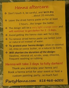 a yellow sign with instructions on how to do henna