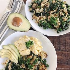 two white plates filled with food next to an avocado