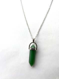 "Green Aventurine Crystal Pendant Necklace  Chain is silver plated 18inches  ‼️ Please note each stone varies as these are natural stones neither all are the same‼️ \"The necklace of luck\"  Green Aventurine is known to attract luck and prosperity and is known as one of the luckiest crystals. It is also said to uplift the spirits and enhance the sense of humour. It has a positive effect on the psych and strengthens ones sense of well-being. Some wear Green Aventurine to increase intelligence, pe Green Aventurine Gemstone Crystal Necklaces, Green Aventurine Gemstone Crystal Necklace, Green Aventurine Crystal Necklaces With Natural Stones, Green Aventurine Crystal Necklace With Natural Stones, Green Aventurine Natural Stone Crystal Necklace, Green Aventurine Crystal Necklace Gift, Green Aventurine Crystal Necklace For Gift, Green Aventurine Pendant Crystal Necklace, Green Agate Gemstone Crystal Necklace