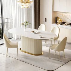 a dining room table with white chairs and a chandelier hanging from the ceiling