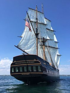 an old fashioned sailing ship in the ocean