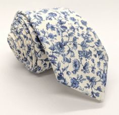 -Handmade blue floral skinny tie -Men's Tie is 58 in. long and 2.25 in. wide -Kids ties have an adjustable neck strap -Iron on high if any wrinkles occur -100% cotton -Great tie for weddings, prom/homecoming, church, or work -Spot clean with a water and a bit of laundry stain remover. Allow to air dry Floral Wedding Tie, Chinoiserie Wedding, Blue Floral Tie, Blue Floral Wedding, Blue White Weddings, Wedding Tux, Kids Ties, Groomsmen Ties, Groom Ties