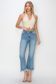 RISEN High Rise Step Hem Flare Jeans Medium wash stretch denim designed with a high rise, paneled detail, crop flare silhouette and finished with a step frayed hemline. The paneled detail adds a flattering and unique design making these jeans stand out. Medium wash High rise No distressing Cropped flare silhouette Frayed hem Step hemline Rise: 10.5" Inseam: 27" Fabric Content: 93% Cotton / 5% Polyester / 2% Spandex Fit: True to size Sizing: 1(25), 3(26), 5(27), 7(28), 9(29), 11(30), 13(31), 15(3 High Rise Distressed Cotton Flare Jeans, Relaxed Fit High-waisted Cotton Flare Jeans, Mid-rise Flare Jeans With Frayed Hem, Cheap Mid-rise Flare Jeans With Frayed Hem, High-rise Denim Blue Flare Jeans With Frayed Hem, Baywatch, Basic Style, Flare Jeans, Fit And Flare