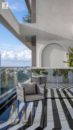 a balcony with black and white stripes on the floor