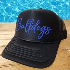 Super fun trucker hats that can be customized with your team name, mascot, phrase and more!   They are created with puff embossed print and look fantastic in our huge assortment of puff colors. Hat Colors:  All Black, All White, Black Back with White Front Closure: The back is an adjustable snap back Please List: 1. Text Style ( Script or Athletic Font Shown) ** please reach out first if you have a custom text or logo. 2. Text on Hat (8-10 characters) ** the more characters there are the smaller Athletic Fonts, Custom Baseball Hats, Mom Hat, Embossed Printing, Mom Hats, Hat For Women, Black Back, Football Mom, Text Style