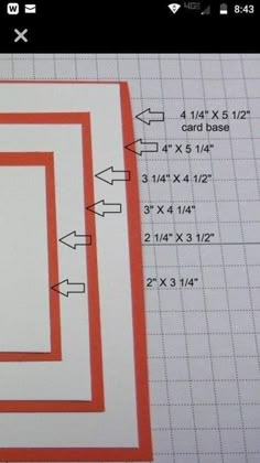 a close up of a piece of paper with numbers and arrows on it in front of a ruler