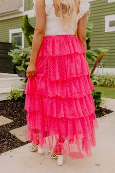 - This trendy tulle skirt in a showstopper! - Airy tulle material with a dot print and a built in lining - A stretchy elastic waistline - A Flowy tiered silhouette that ends in a high-low hemline with the front ending mid-thigh Pink Mesh Bottoms For Spring, Polka Dot Bottoms For Spring Party, Polka Dot Party Bottoms For Spring, Spring Mesh Flowy Skirt, Summer Tiered Mesh Skirt, Pink Flowy Tiered Skirt, Pink Full Tulle Skirt Bottoms, Summer Mesh Tiered Skirt, Spring Mesh Tiered Skirt