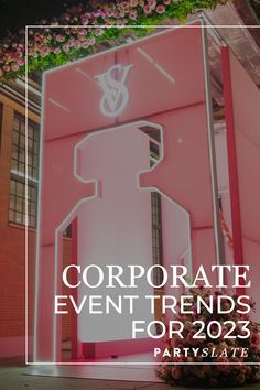 a pink sign that says corporate event events for 205 $ per person in front of a building