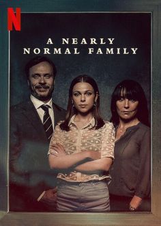 three people standing in front of a poster with the caption'no normal family '