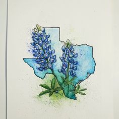 a watercolor painting of blue flowers on a white paper with the outline of indiana in the background