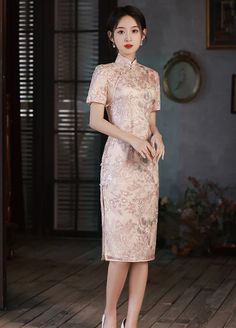 Elegant Pink Ao Dai With Floral Embroidery, Formal Fitted Pink Cheongsam, Pink Cheongsam For Spring Party, Fitted Pink Dress With Stand Collar, Pink Fitted Dress With Stand Collar, Pink Spring Party Cheongsam, Fitted Floral Embroidered Cheongsam For Party, Pink Fitted Cheongsam With Short Sleeves, Fitted Floral Embroidery Cheongsam For Party