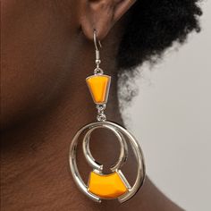 Bold Silver Circles Create An Eye-Catching Frame For A Vibrant Marigold Faceted Bead. The Trendy Pendant Sways From A Marigold Triangular Bead Anchor For An Embellished Finish. Earring Attaches To A Standard Fishhook Fitting. Summer Yellow Metal Jewelry, Yellow Metal Party Jewelry, Pink Chandelier Earrings, Red Hoop Earrings, Light Blue Gemstone, Diamond Shape Earrings, Brown Earrings, Gemstone Drop Earrings, Orange Earrings