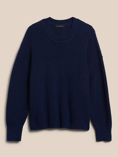 A playful take on modern proportions, this organic cotton sweater is at once preppy and relaxed with an oversized cut and classic details, like a traditional crew neck and dropped shoulder.  OVERSIZED FIT: Cut for a loose, relaxed fit with a dropped Casual Capsule Wardrobe, Navy Blue Sweater, True Winter, Spring Sweater, Navy Sweaters, Blue Sweater, Church Decor, Cotton Sweater, Sweaters Oversized