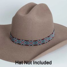 Crafted with high-quality materials and intricate beadwork, this hat band is a statement piece that will add a touch of rugged sophistication to any hat. The warm brown tones and rustic design make it a versatile choice for any occasion, whether you're hitting the rodeo or simply want to add a bit of western flair to your everyday look.**Please note this is the hatband only** Brown Hat Bands One Size Fits Most, Adjustable Festival Hat Headpiece, Handmade Brown Country Hat Bands, Southwestern Brown Hat Bands For Rodeo, Beaded Brown Hat Band For Festival, Traditional Beaded Adjustable Hat, Beaded Brown Hat Bands For Festival, Adjustable Brown Hat For Festival, Brown Adjustable Hat For Festivals