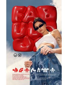 a woman holding onto a pair of blue jeans in front of a giant red balloon