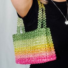 This beautiful bead bag will really make you sparkle!  A Cuteryko exclusive. Designed by Cuteryko and available nowhere else! Size: 13x19cm  handle: 17cm Green Square Beaded Bag, Green Beaded Bags For Daily Use, Green Beaded Shoulder Bag For Daily Use, Trendy Green Beaded Bag, Trendy Multicolor Beaded Shoulder Bag, Trendy Multicolor Beaded Bags, Multicolor Square Beaded Bag, Hand Beaded Bag, Bead Bag