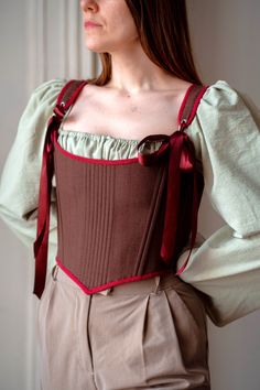 Reversible renaissance corset, linen overbust corset, brown & burgundy floral corset, Cosplay costume, princess stays, custom corset Transform your wardrobe with this stunning reversible corset ♡ Adorned in burgundy linen and classic brown linen on the other, this versatile piece offers double the style in one chic design. Featuring back lacing this corset ensures a perfect fit while adding an elegant touch to any ensemble.  ♡ Features♡ An accessory that evokes feelings of femininity, slendernes Fitted Corset Belt For Medieval Festivals, Medieval Fitted Overbust Corset Belt, Fitted Medieval Overbust Corset Belt, Historical Design Fitted Corset For Larp, Gothic Brown Corset For Costume, Vintage Brown Corset For Larp, Brown Gothic Corset For Costume, Fitted Brown Corset For Cosplay, Brown Fitted Corset For Cosplay