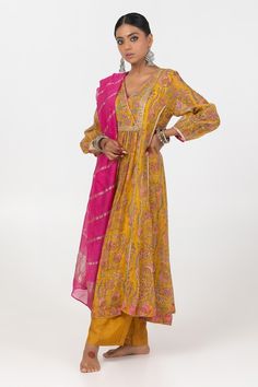 Mustard yellow A-line kurta with floral block print and sequin embroidered gathered yoke. Paired with matching embroidered hem pant. - Aza Fashions Yellow Kurta, Kurta Patterns, Floral Block Print, Kurta For Women, Embroidered Hem, A Line Kurta, Floral Pajamas, Embroidery Floral, Pajama Pant