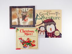 three children's books are displayed on a white surface, including one for christmas and the other for santa's favorite story