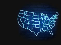 the united states is lit up with neon blue lights in the shape of the usa