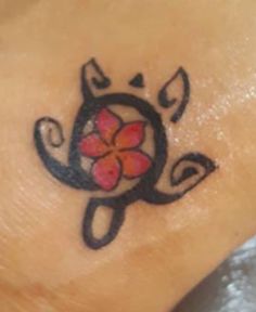 a small tattoo on the foot of a person