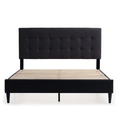 a black bed frame with wooden slats and headboard is shown in front of a white background