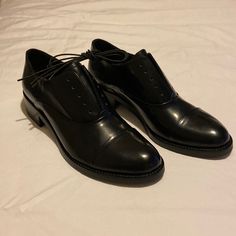 Size 9 (Eu 39.5) Brand New. Never Worn. Black Patent. 1.5” Heel. Cap Toe. Can Be Worn With Or Without Laces (Included). No Box. No Scuffs Or Marks. Classic Black Low Heel Lace-up Shoes, Black Cap Toe Lace-up Shoes For Office, Black Cap Toe Lace-up Office Shoes, Formal Cap Toe Oxfords, Black Cap Toe Dress Shoes For Fall, Black Cap Toe Loafers, Black Cap Toe Loafers For Office, Classic Black Low Heel Leather Shoes, Black Cap Toe Office Loafers