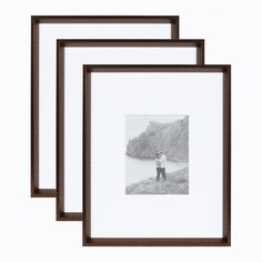 three black and white photos are hanging on the wall