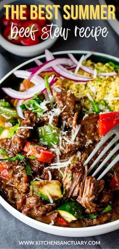 the best summer beef stew recipe in a white bowl with a fork and vegetables on top