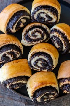 a pan filled with sliced poppy seed rolls