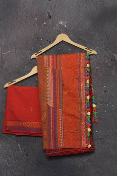 Leave a lasting impression with the most graceful Madhubani Saree in Red colour. Ace your ethnic style with this traditional attire that would grab all the eyeballs on a wedding occasion. This saree comes in silk fabric having numerable design patterns that have been woven in various colours. The diversity of colours makes the saree stand out. The borders of the saree have an exquisite design that is eye-catchy and has cute little different coloured tassels attached to it. Complete the look with Red Cotton Silk Dupatta With Zari Work, Red Cotton Silk Traditional Wear With Traditional Drape, Traditional Red Cotton Silk Salwar Kameez, Red Raw Silk Salwar Kameez For Navratri, Red Cotton Silk Salwar Kameez For Navratri, Festive Red Cotton Silk Traditional Wear, Red Bollywood Cotton Silk Dupatta, Bohemian Cotton Silk Traditional Wear For Navratri, Red Cotton Silk Dupatta With Traditional Drape