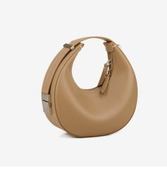 Indulge in timeless elegance with our Genuine Leather Crescent Hobo Handbag. Crafted from high-quality genuine leather, this exquisite handbag features a sleek half-moon design that effortlessly elevates any ensemble. With its attention to detail and superior craftsmanship, it exudes sophistication and refinement. Whether draped over your shoulder or tucked under your arm, this versatile accessory is perfect for both casual outings and special occasions. Make a statement with the understated glamour of our Crescent Hobo Handbag. Main Material: GENUINE LEATHER Lining Material: POLYESTER Interior: Interior Slot Pocket Size: 22 X 6 X 11CM (8.6 x 2.3 x 4.3 inches) Understated Glamour, Moon Bag, Hobo Handbag, Genuine Leather Handbag, Black Leather Handbags, Moon Design, Hobo Handbags, Bag Design, My Personal Style