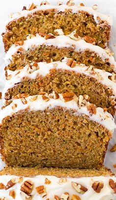 sliced carrot bread with cream cheese frosting and pecans