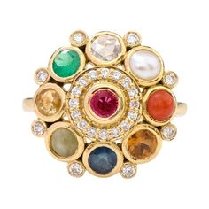 18 Karat Yellow Gold Nine Precious Gems "Navratan" Statement Ring This regal modern Navratan (nine) gem and diamond ring is exquisite. Navratnas of the nine gemstones represent the nine planets on which Indian astrology is based and wearing them together is believed to attract good positive vibes from all planets. The nine gems, namely, ruby, diamond, pearl, yellow sapphire, coral, blue sapphire, cat’s eye, garnet, and emerald, each have a symbolic meaning comprising of happiness, health, wisdom Nine Gems Ring, Exquisite Multi-stone Diamond Gemstones, Heirloom Multi-stone Yellow Gold Gemstones, Fusion Style Multi-stone Yellow Gold Gemstones, Yellow Gold Multi-stone Fusion Gemstones, Heirloom Gemstones With Gemstone Accents, Fusion Gemstones With Gemstone Accents, Fusion Style Multi-stone Gemstones For Wedding, Fusion Multi-stone Gemstones For Weddings