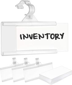 a sign that says inventory hanging from a hook