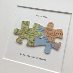 a piece of puzzle with the words no matter the distance printed on it, in front of a white frame